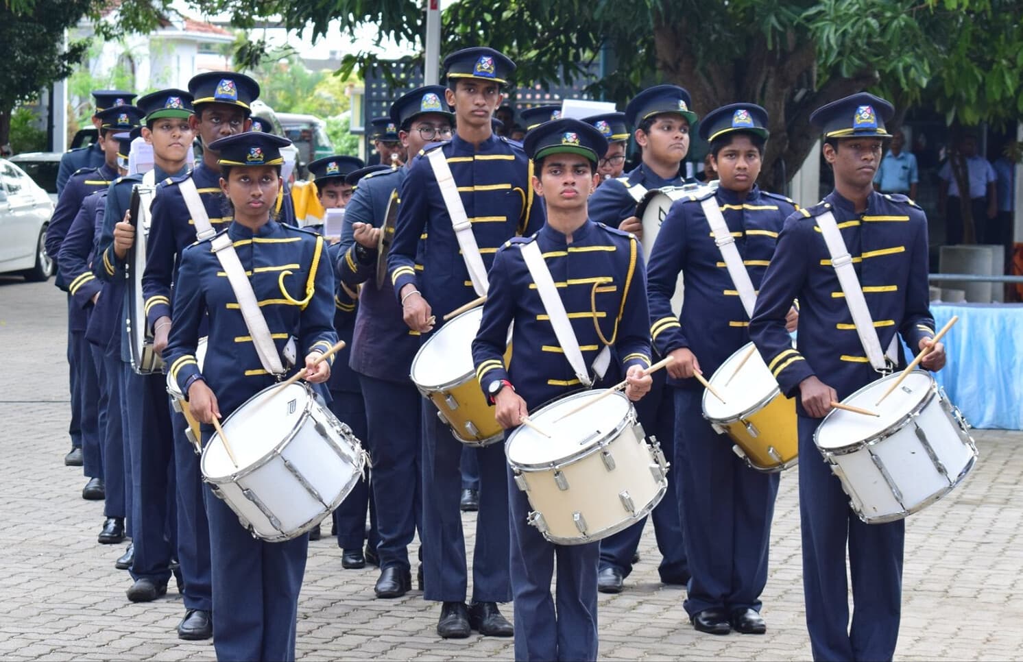 Rian with the school brass band percussion line
